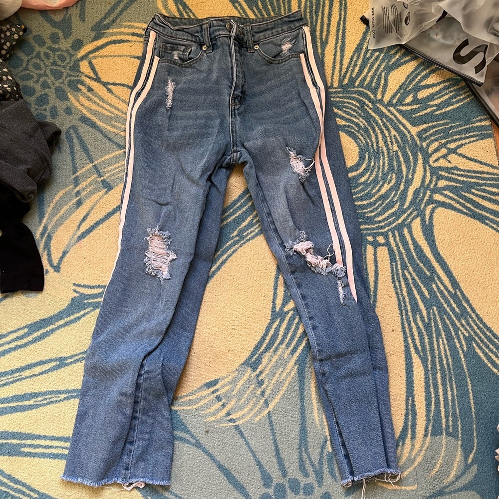Pink stripe ripped jeans